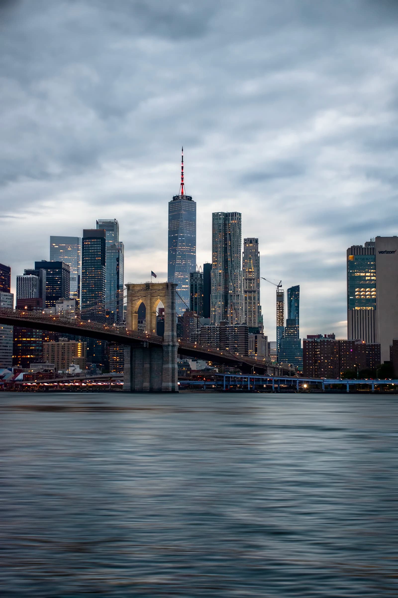 Brooklyn Bridge and the Manhattan skyline at dusk